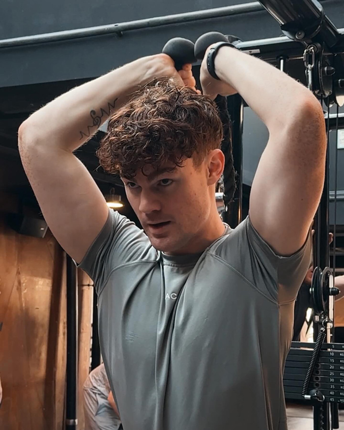 Coach is working out in the gym.